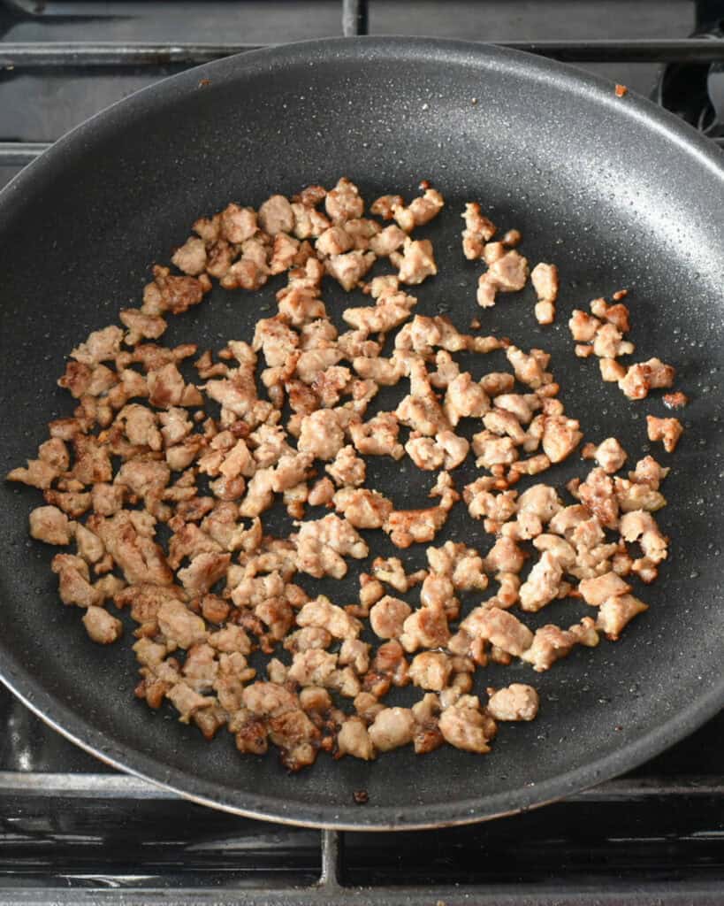 Cook the sausage crumbles until browned.