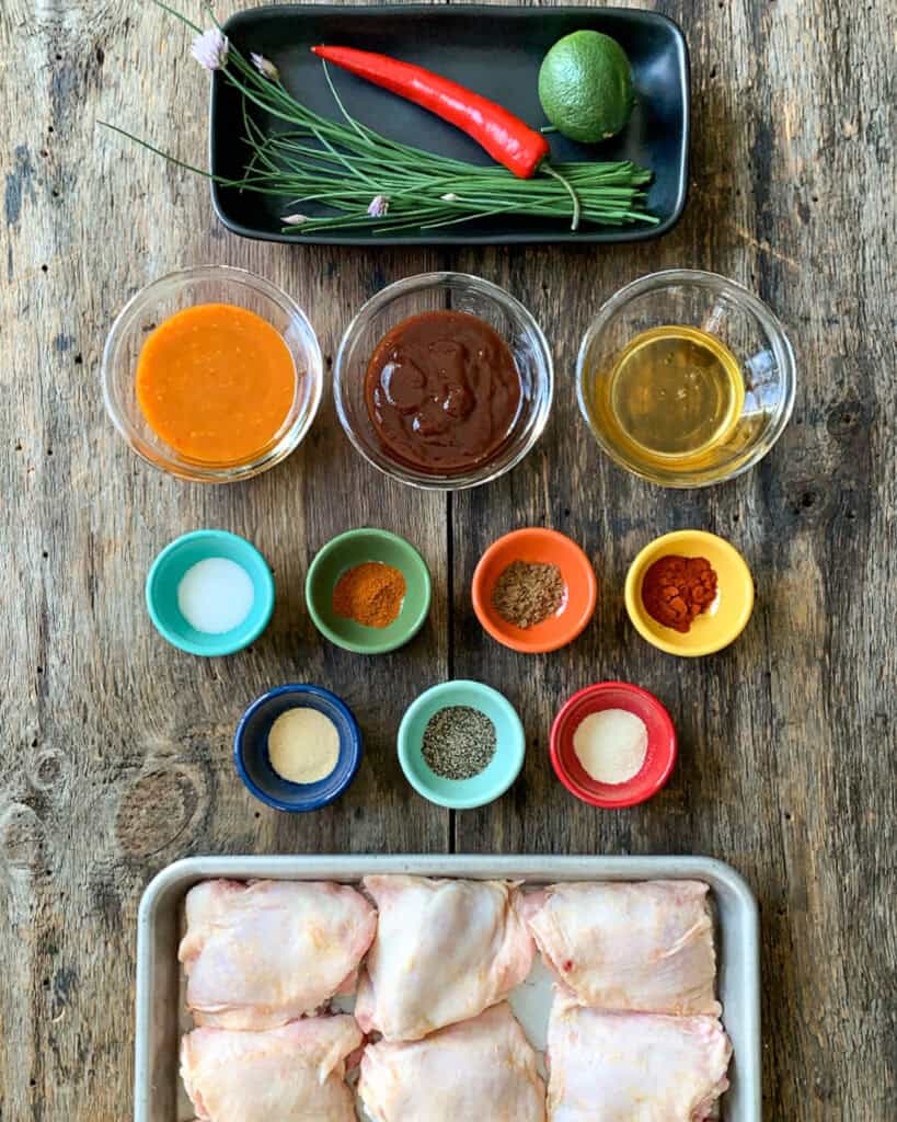 Ingredients for a sweet and spicy grilled chicken thighs recipe.