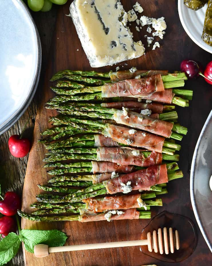 A row of Grilled Prosciutto Wrapped in Asparagus