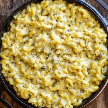 Macaroni and cheese in a cast-iron skillet.