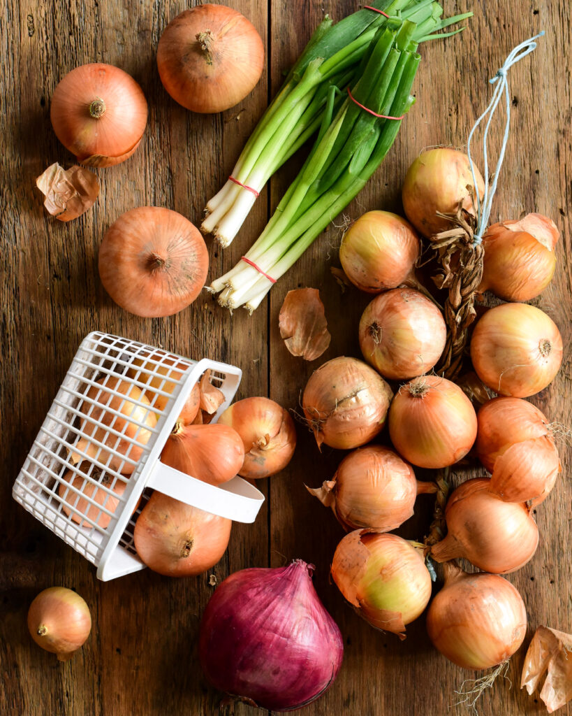 An image of local Ontario onion varieties that will be used in a steak & onion galette.