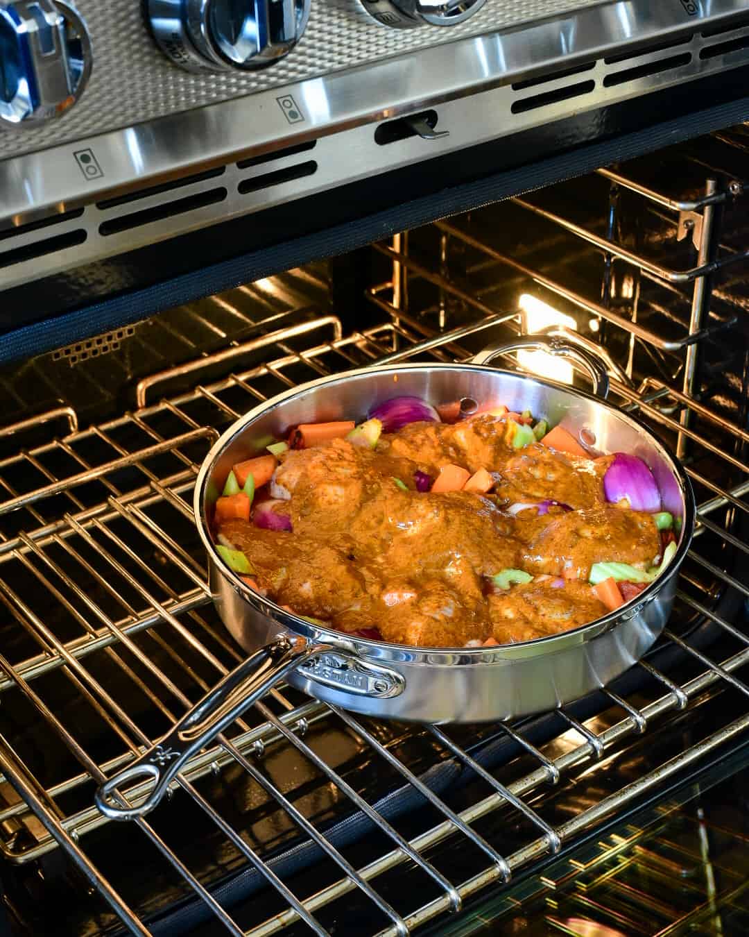 Baked Harissa Spiced Chicken - pan in oven