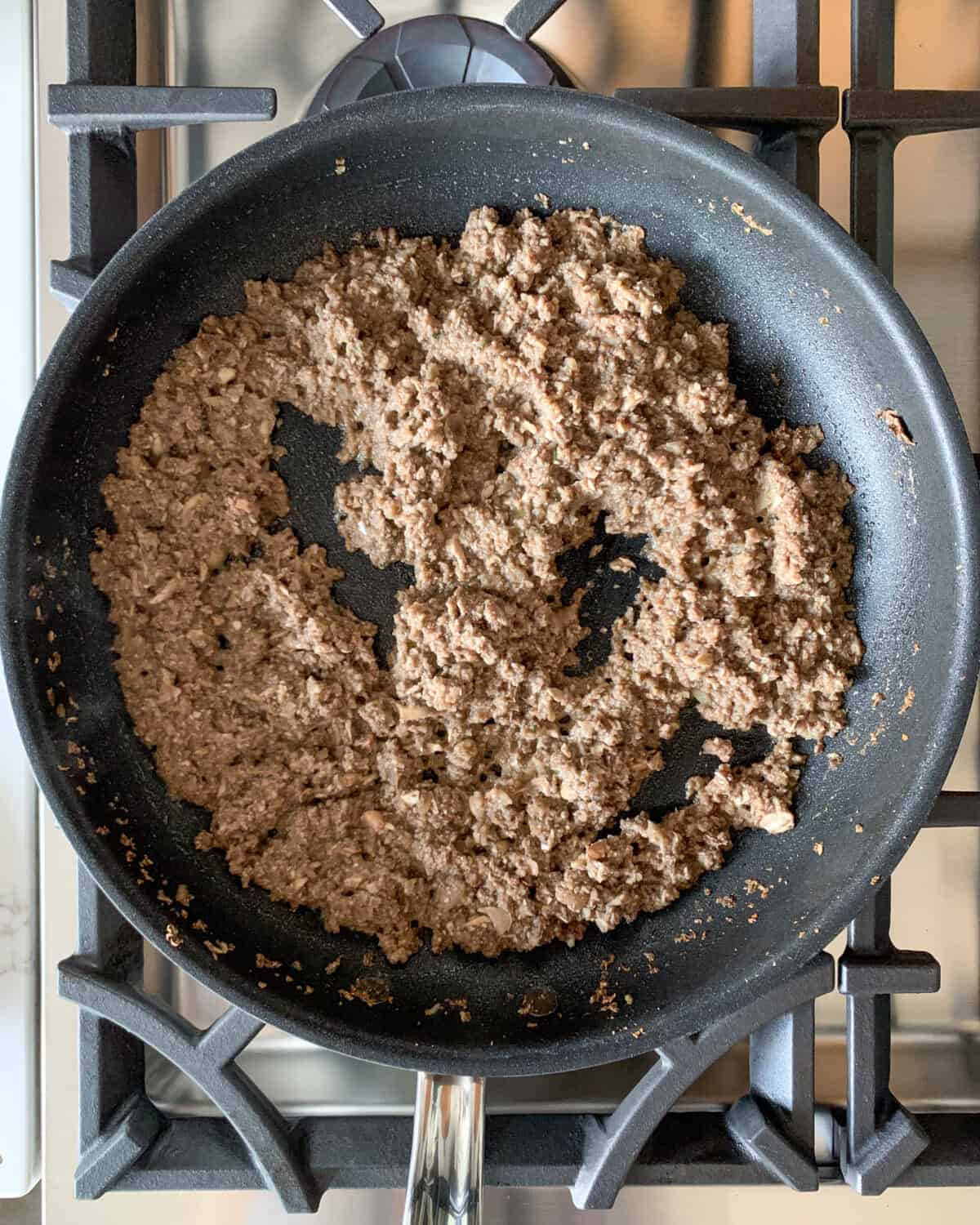 Duxelles is a finely chopped mixture of mushrooms, shallots, garlic, and herbs sautéed in butter until most of the moisture evaporates in a skillet.