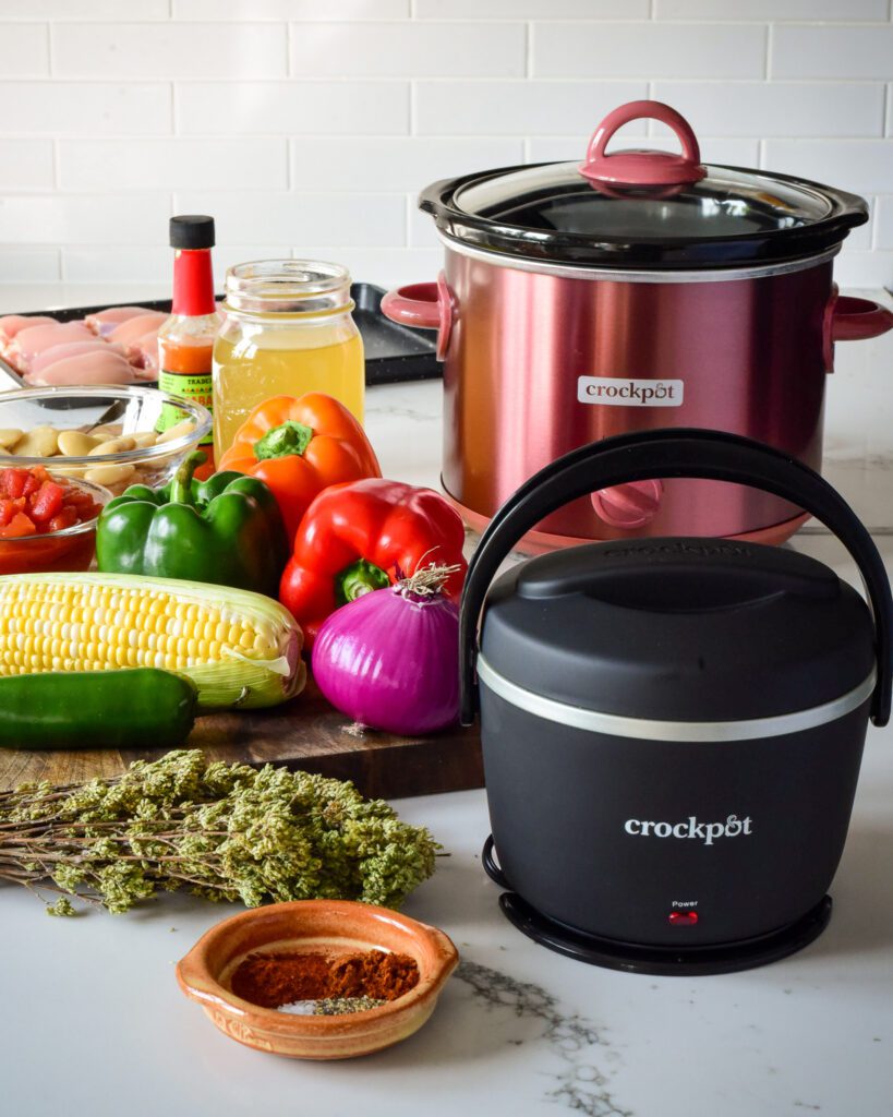 Ingredients for slow cooker chicken chili with a portable 20 oz Lunch Crock and a copper 3 quart slow cooker.