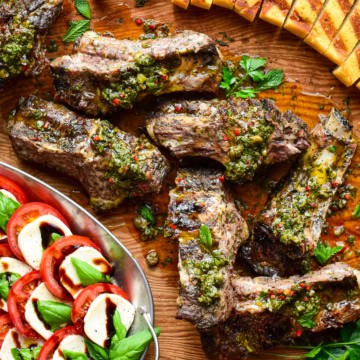 Grilled beef ribs with a green salsa. Served with grilled garlic toast and a Caprese salad.