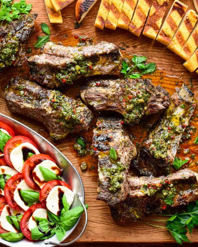 Grilled beef ribs with a green salsa. Served with grilled garlic toast and a Caprese salad.