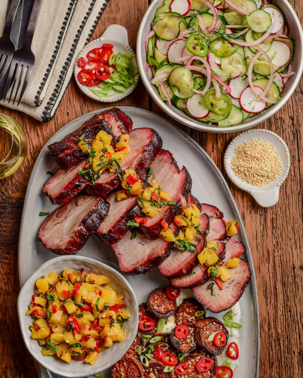 Smoked Char Siu Pork Collar with Grilled Pineapple Relish Served with Cucumber and Radish Salad