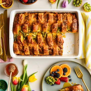 Savoury French Toast Casserole served with fresh fruit for Easter brunch.