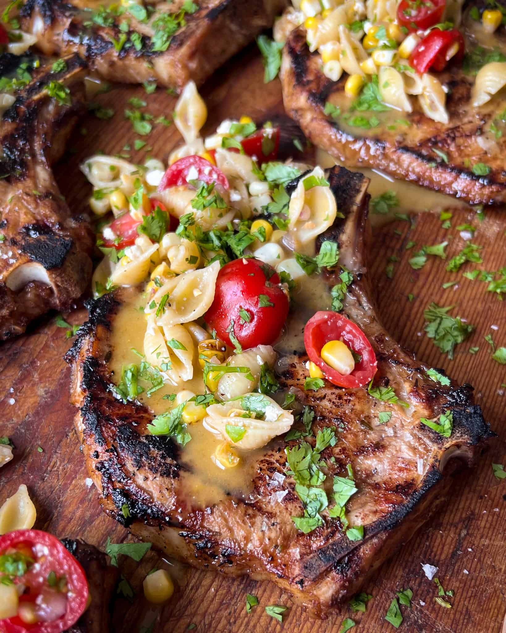 Grilled Pork chops with Honey Mustard Sauce and a grilled corn and tomato pasta salad.