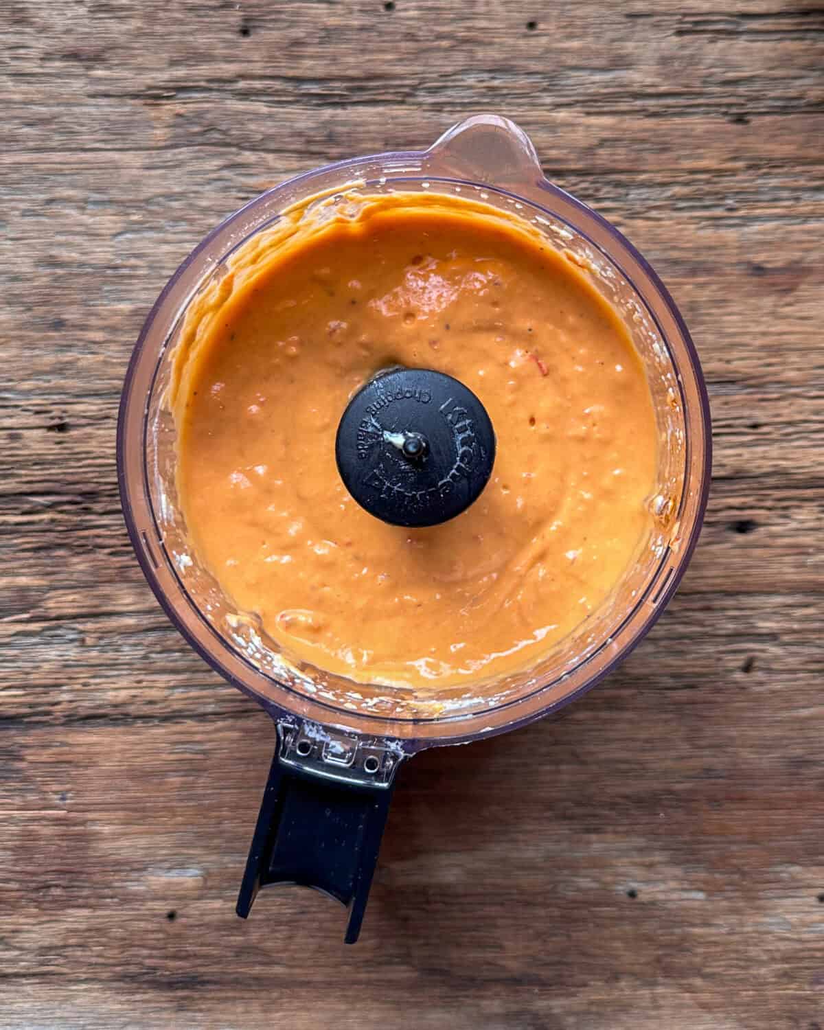 Add the spicy red pepper hummus ingredients into a mini blender, blend until combined and smooth.
