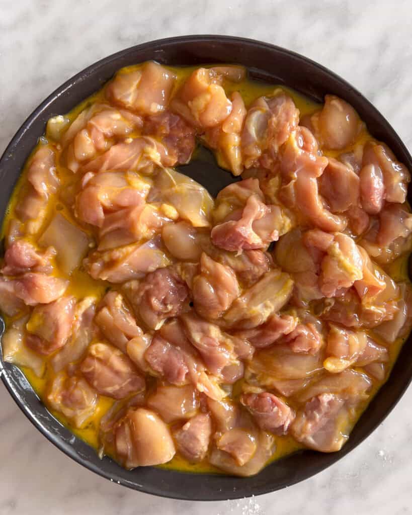 Cubes of chicken coated in egg.