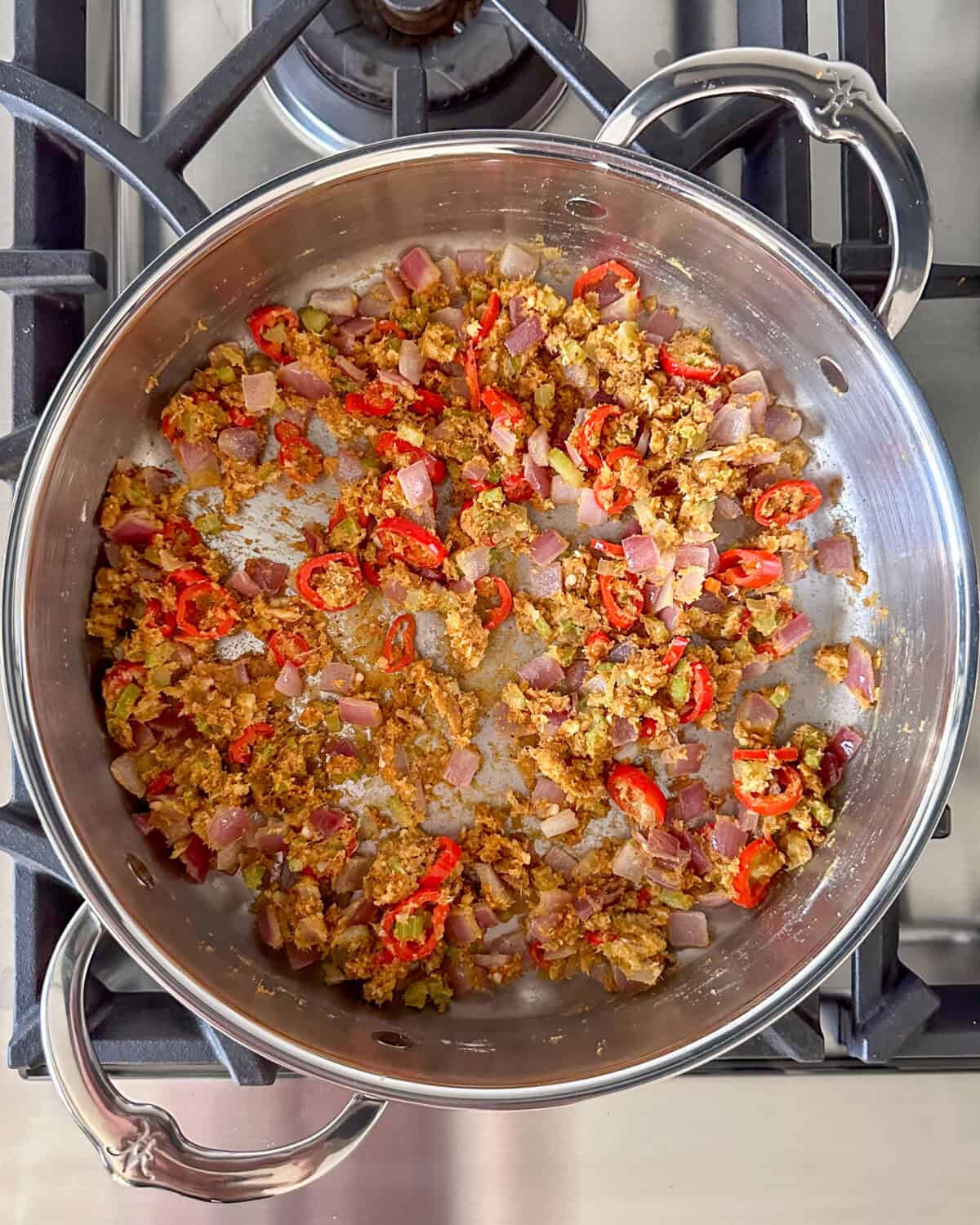 Preparing the yellow curry base.