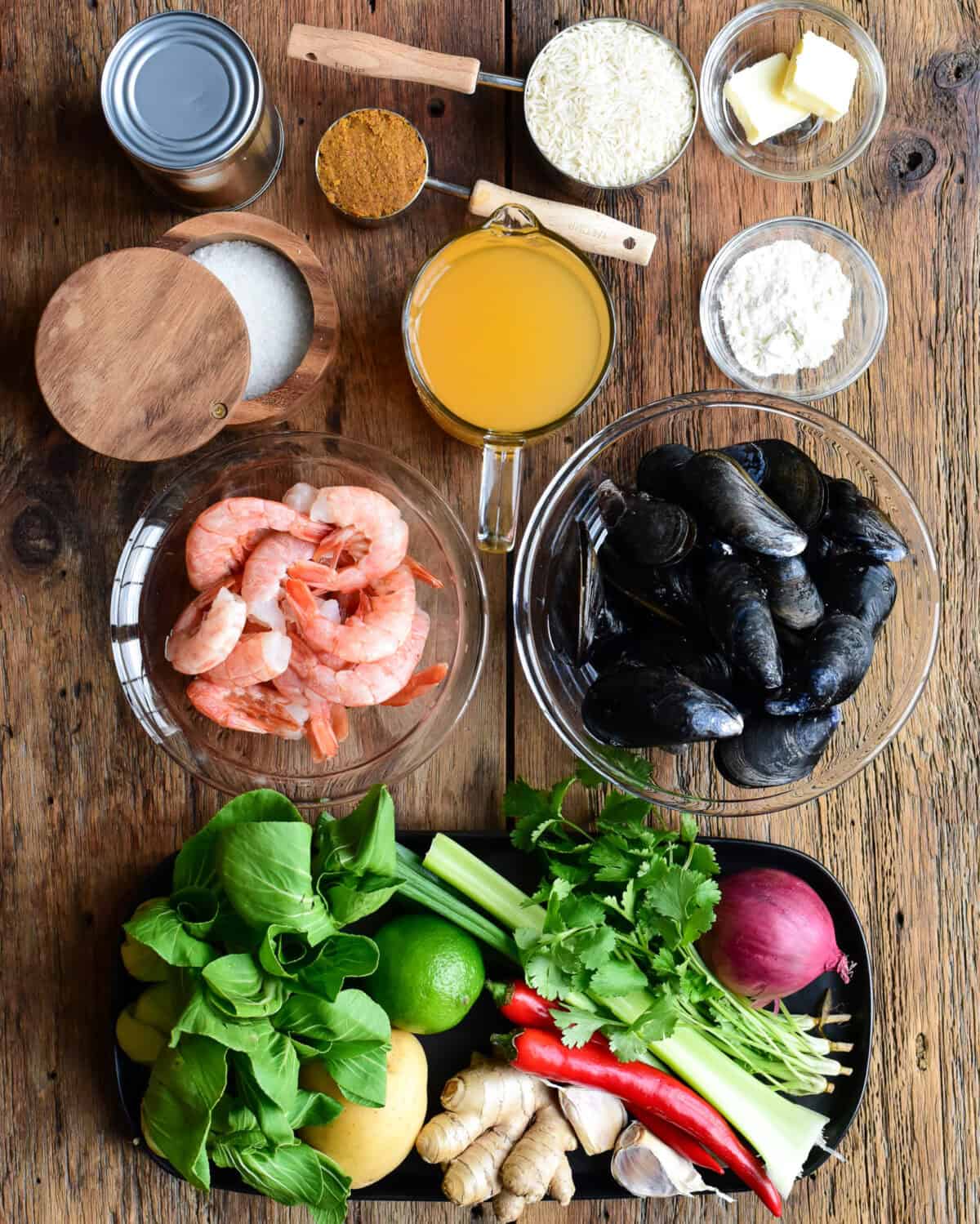 Ingredients used to make a yellow curry shrimp recipe with mussels.