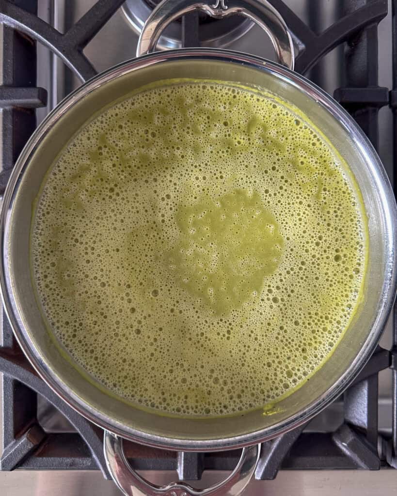 A pot of pureed Spring Pea and Asparagus Soup.
