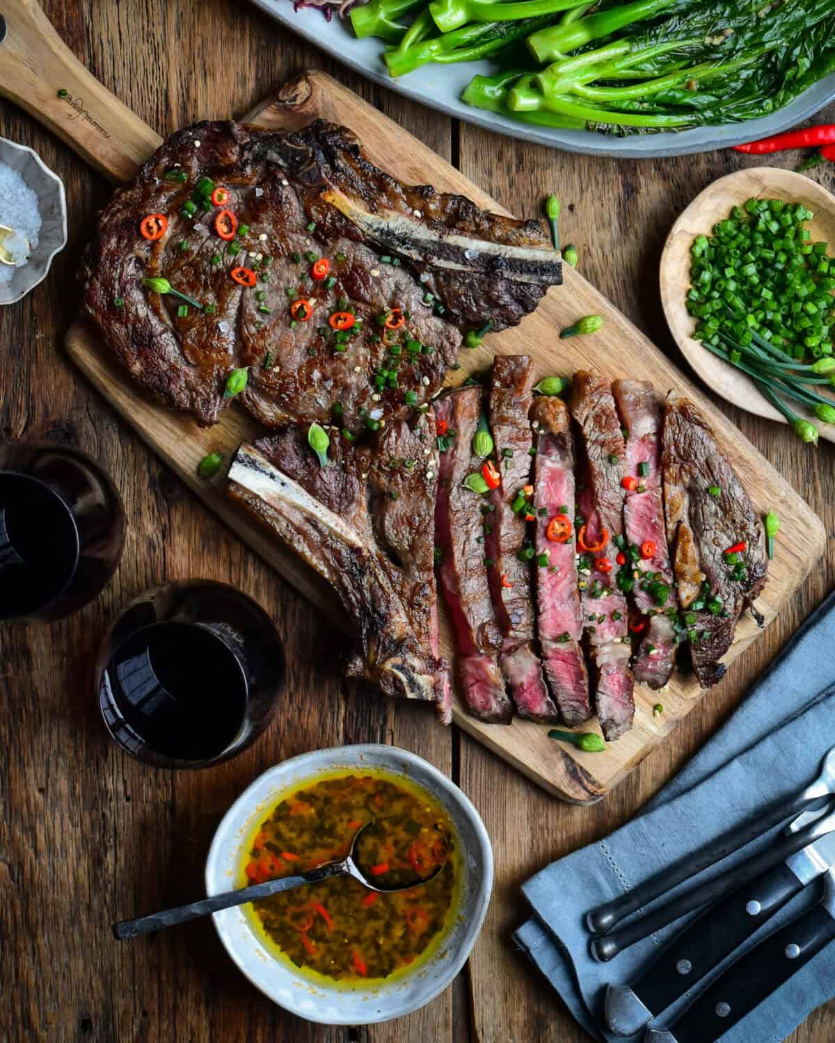 Two Grilled Ribeye Steaks served with an Asian-Inspired Sauce