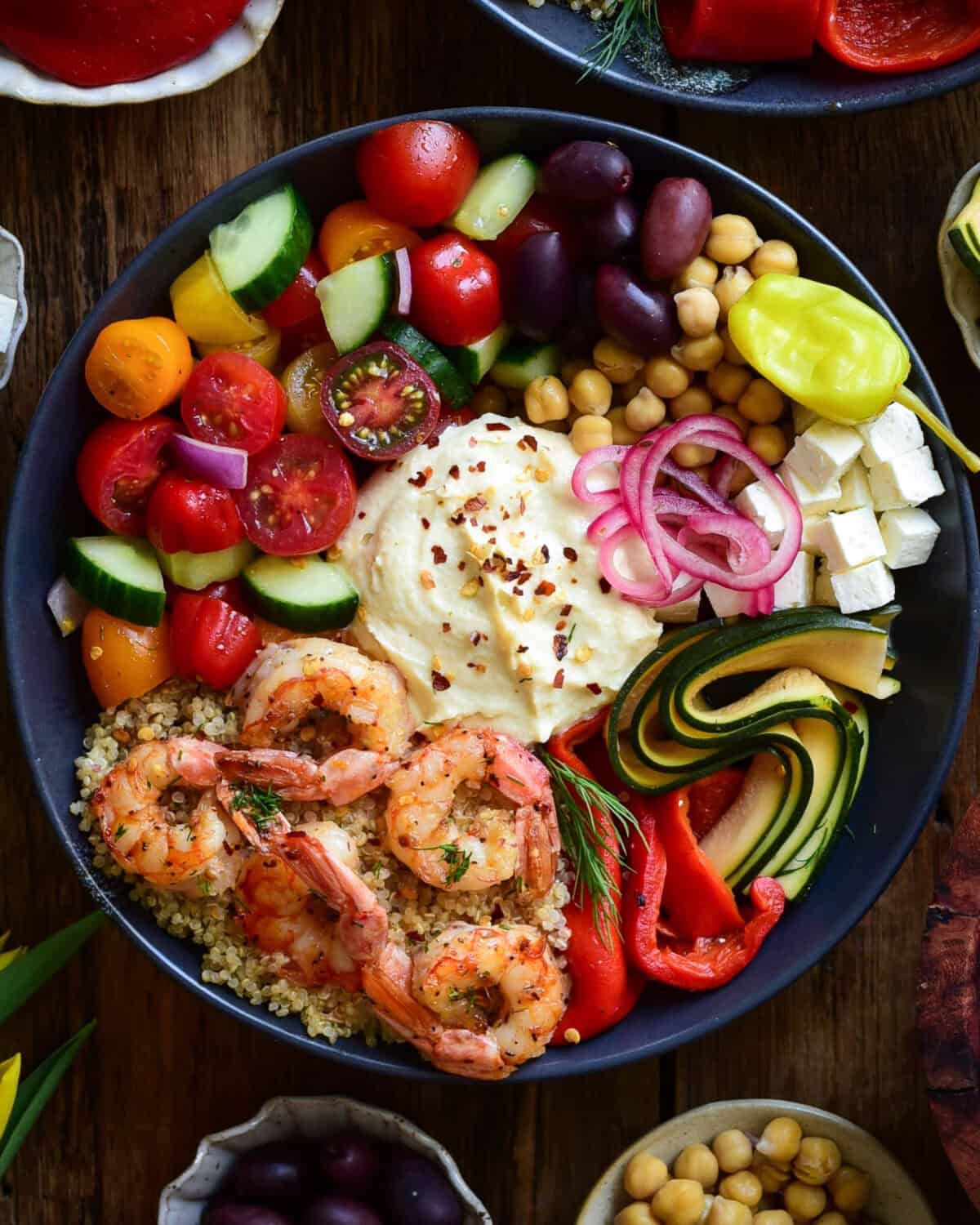 Sheet Pan Lemon Garlic Shrimp Bowl with a variety of Mediterranean ingredients.
