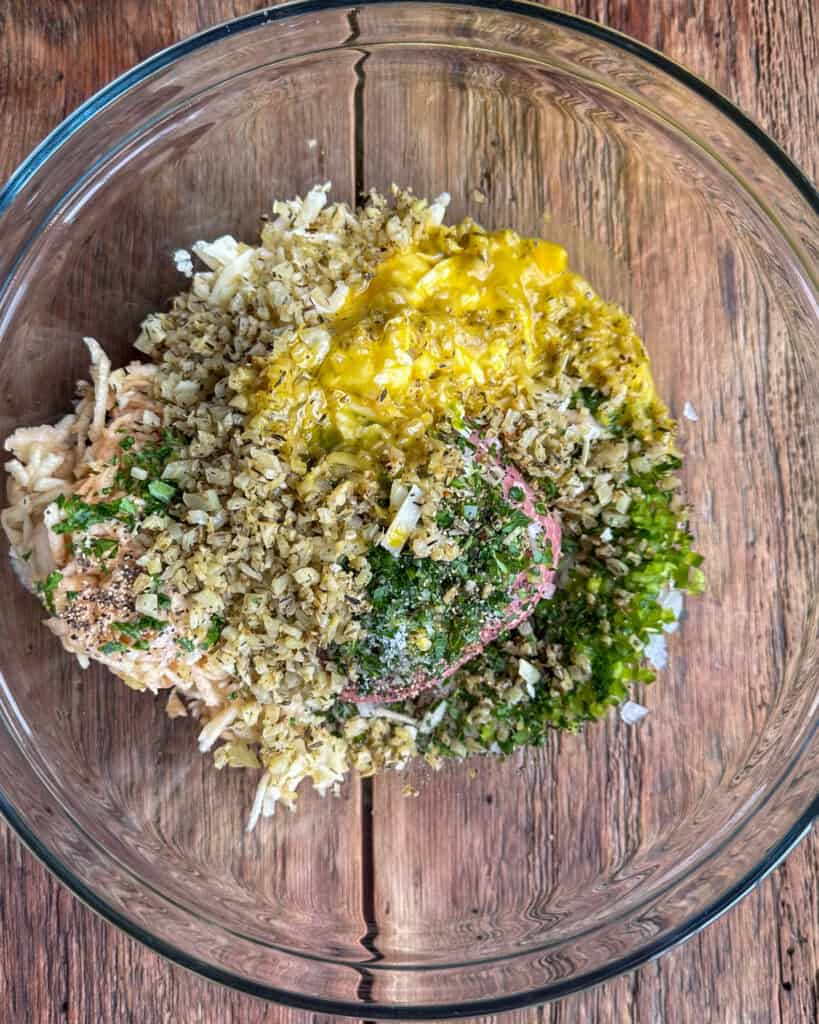 Place the ground pork, apple, cheddar, onion, jalapeno, parsley, one egg, salt and in a bowl. with the cooled fennel.
