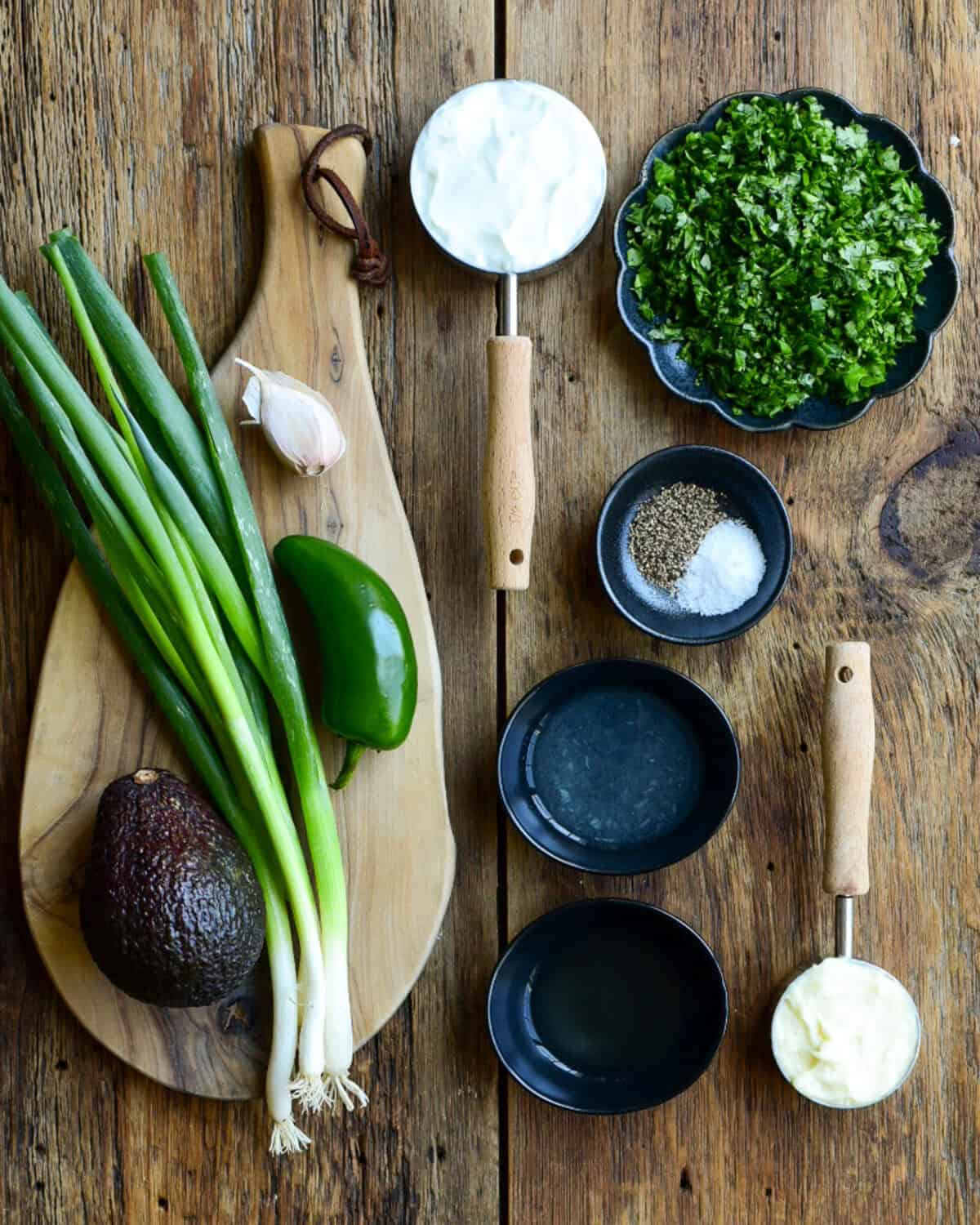 Ingredients for an avocado salad dressing for a smashed potato salad.