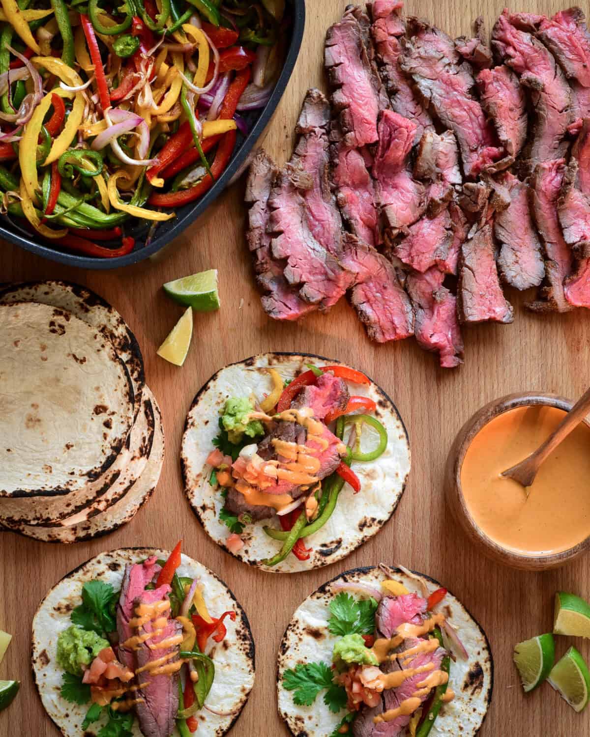 A spread of Air Fryer Flank Steak Fajitas.