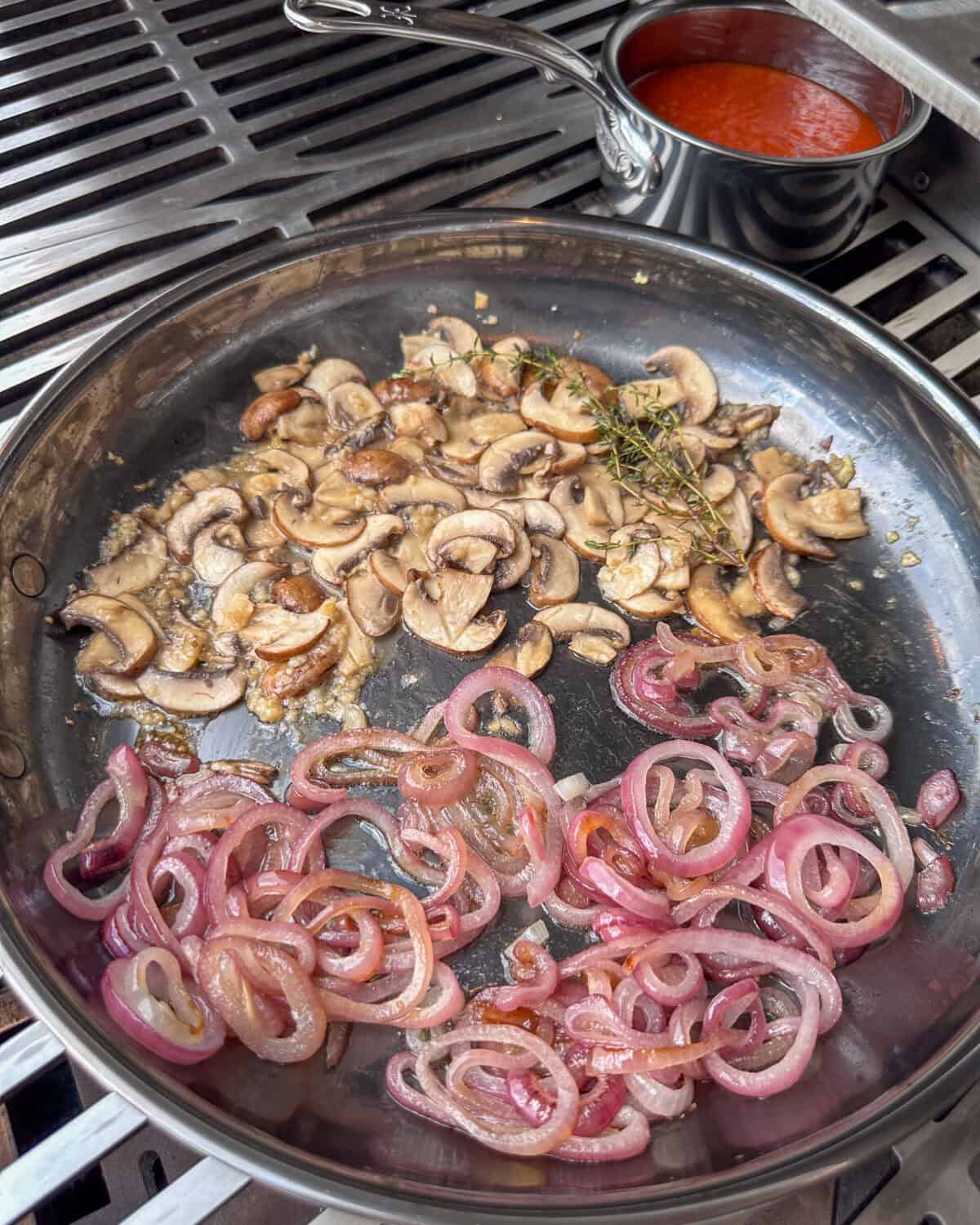 Sauté the onions and mushrooms for the veal sandwiches.