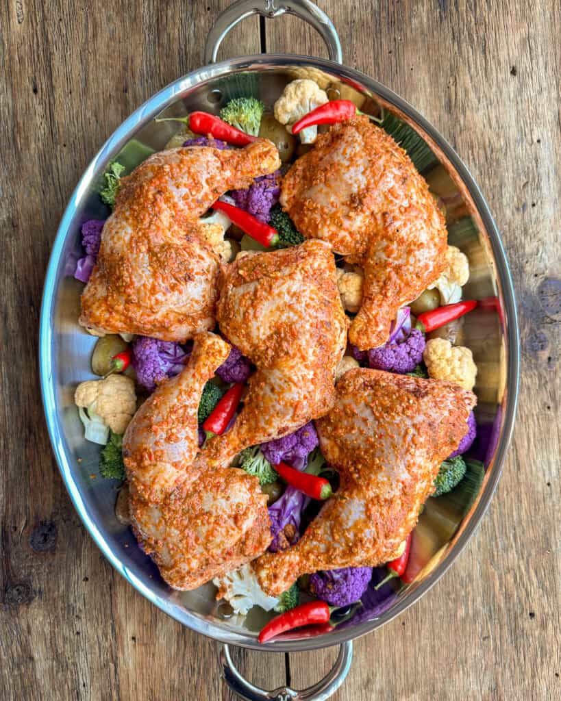 Bruch the chicken with piri piri sauce.