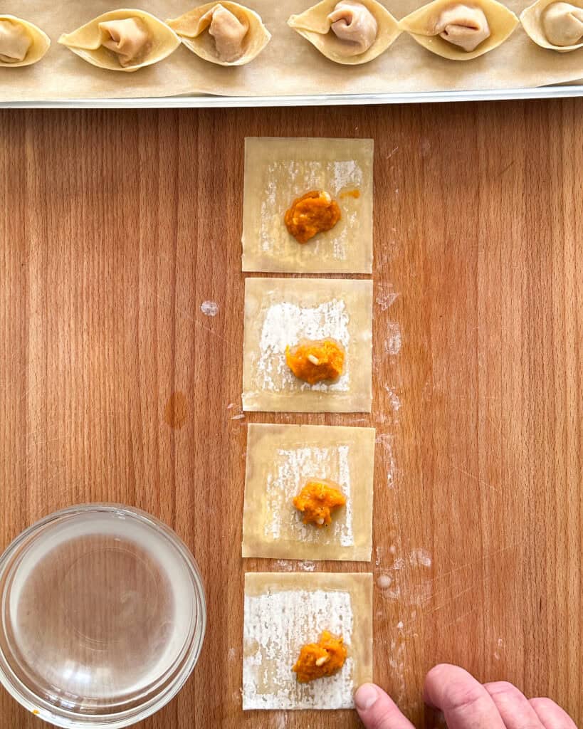 Autumn Wonton Soup - wrap a wonton, step, moisten the wrapper edges with water