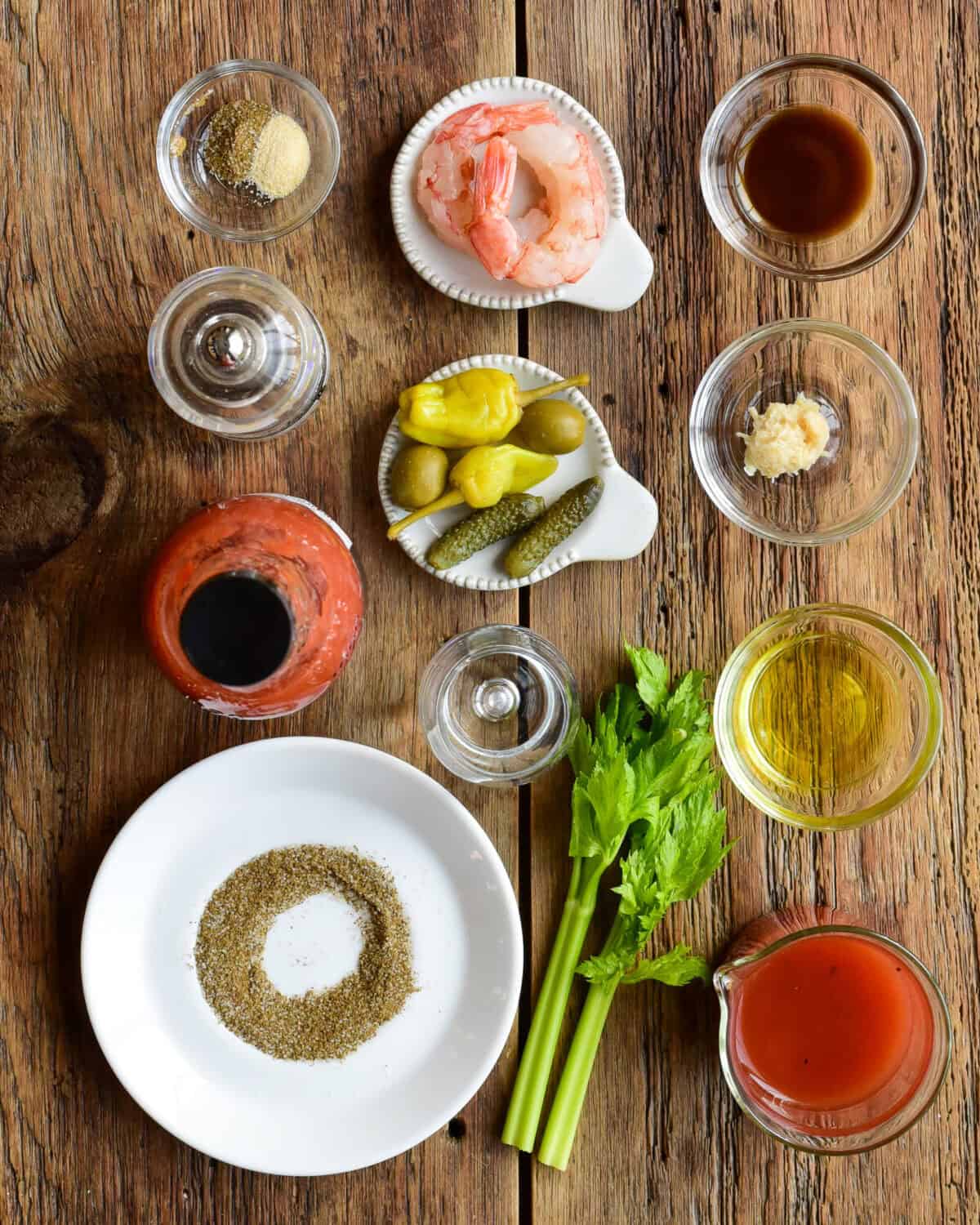 Ingredients for a bloody mary recipe with pickle juice.