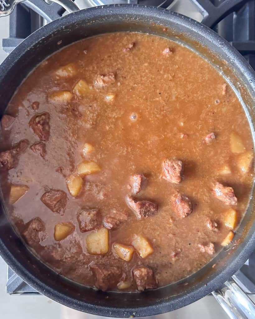 Add the soy sauce, mirin, ginger, potatoes, and lemon zest to the beef stew.