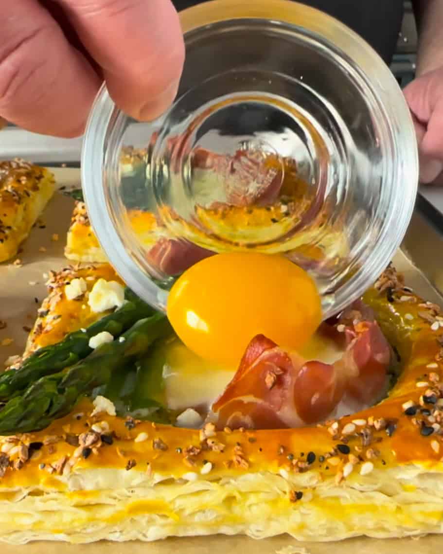 Carefully add the egg yolks ontop of the cooked whites.