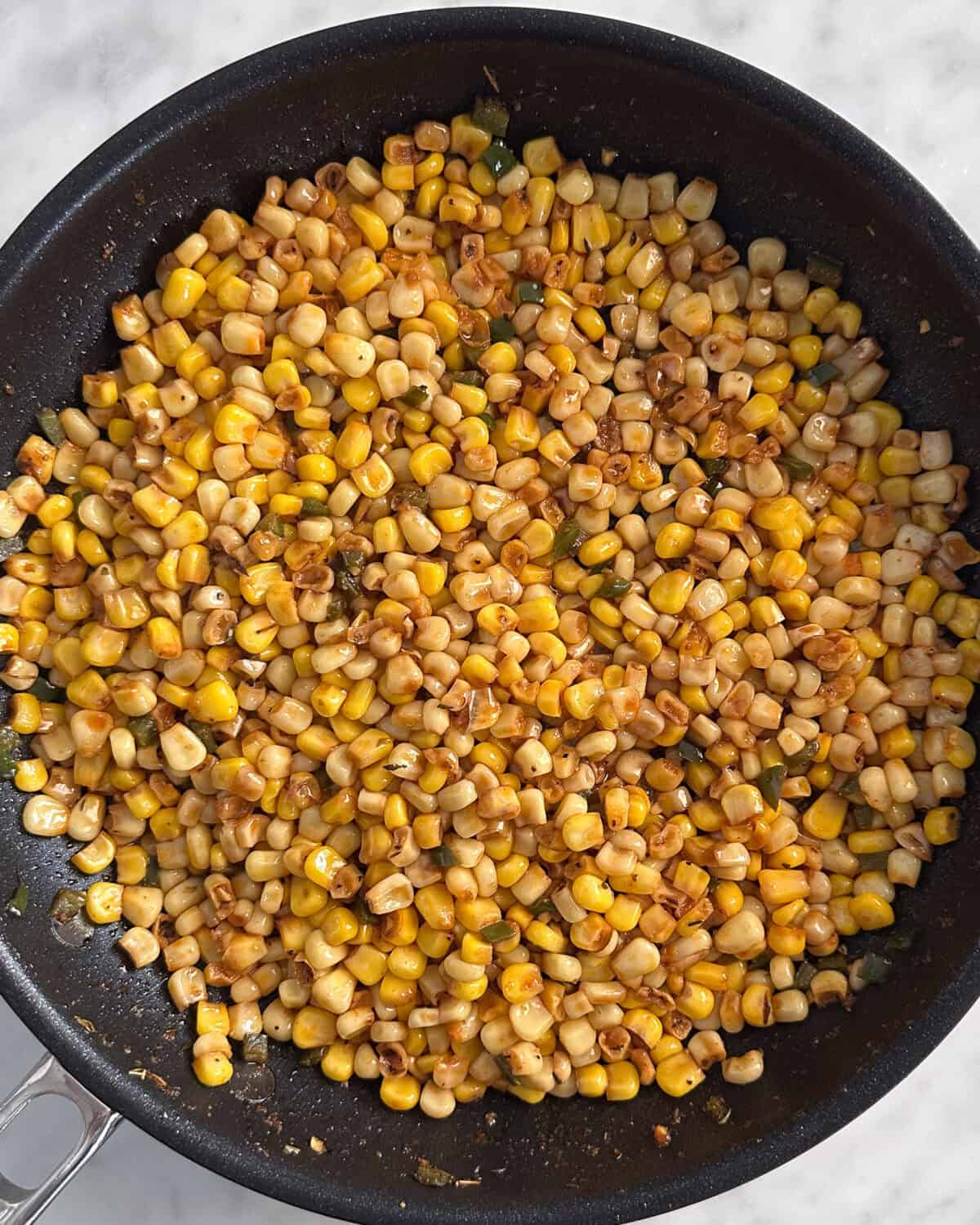 A skillet of Cajun corn.