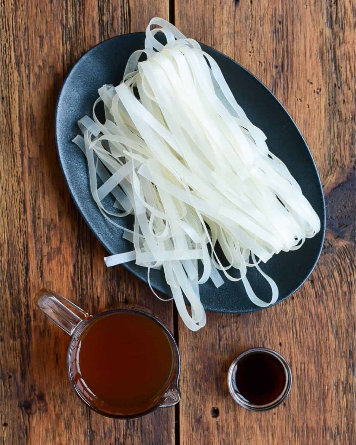 Noodle ingredients for a beef broccoli noodle bowl.