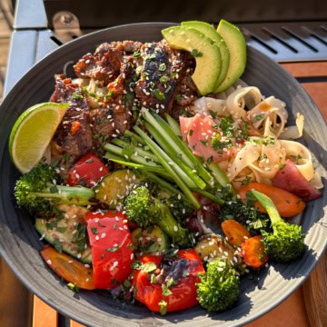 A Beef and Broccoli Noodle Bowl on the Griddle with all the fixings.