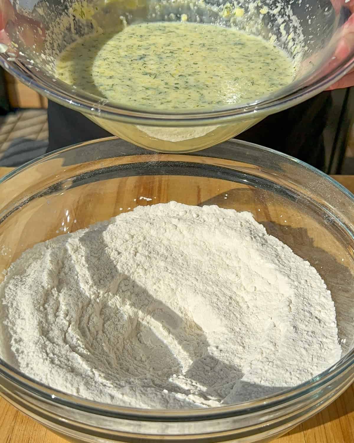 Wet and dry ingredients for a lemon dill pancake recipe.