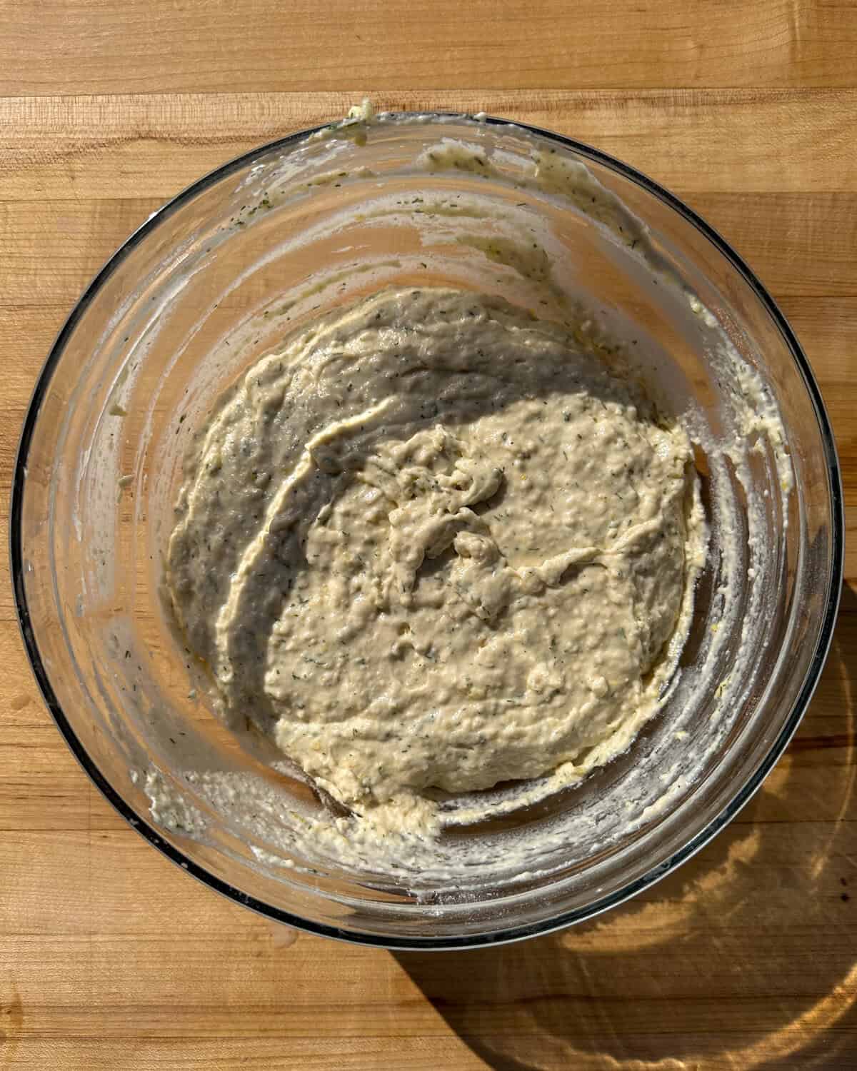 A bowl of lemon dill pancake batter.