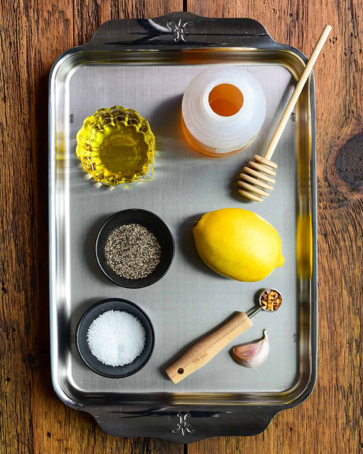 Ingredients for a Lemon–Honey Vinaigrette recipe.