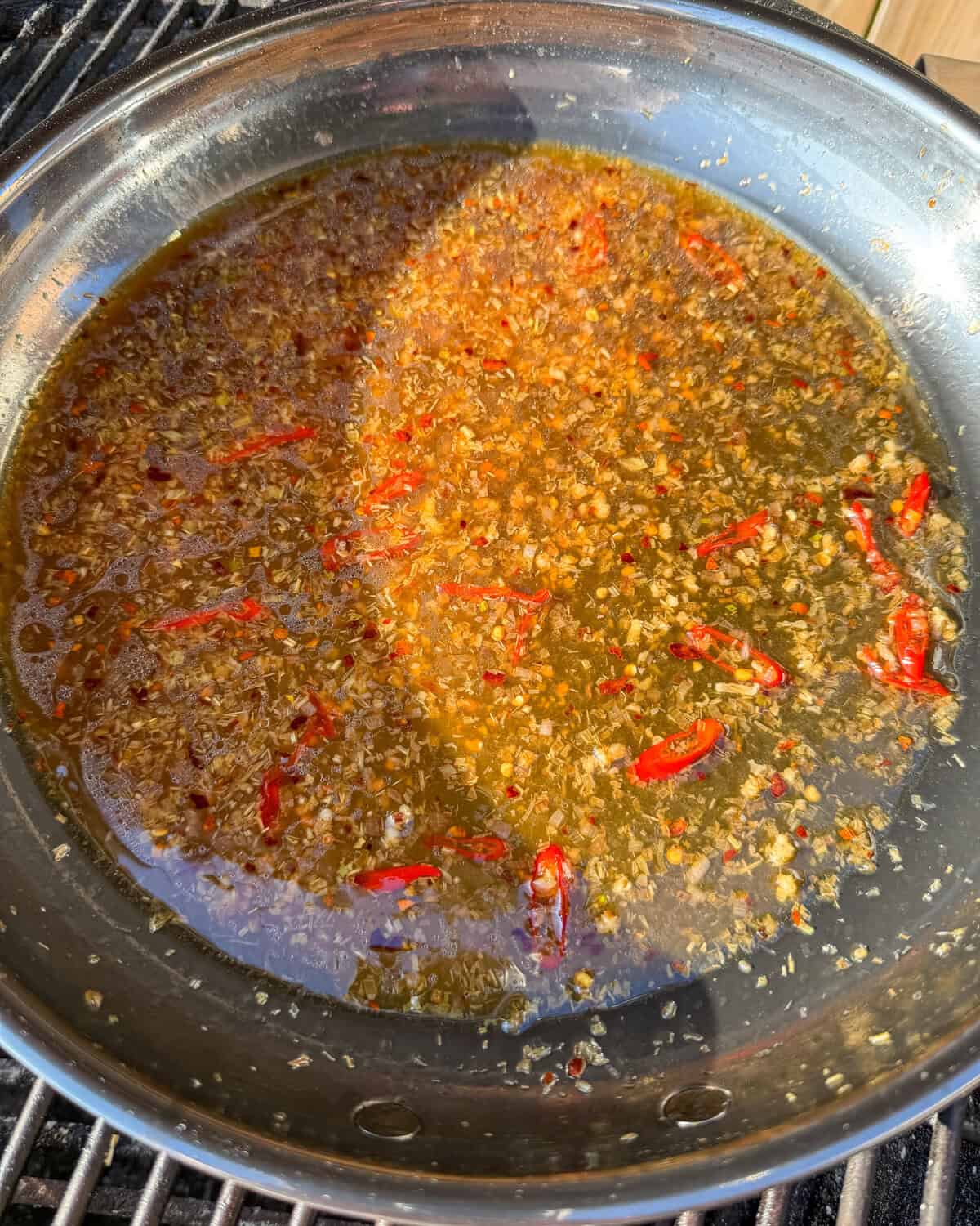 Saute the aromatics for the lemongrass shrimp recipe.