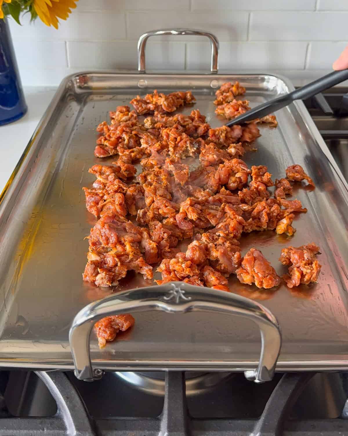 Add the chorizo to a slightly oiled griddle to cook.