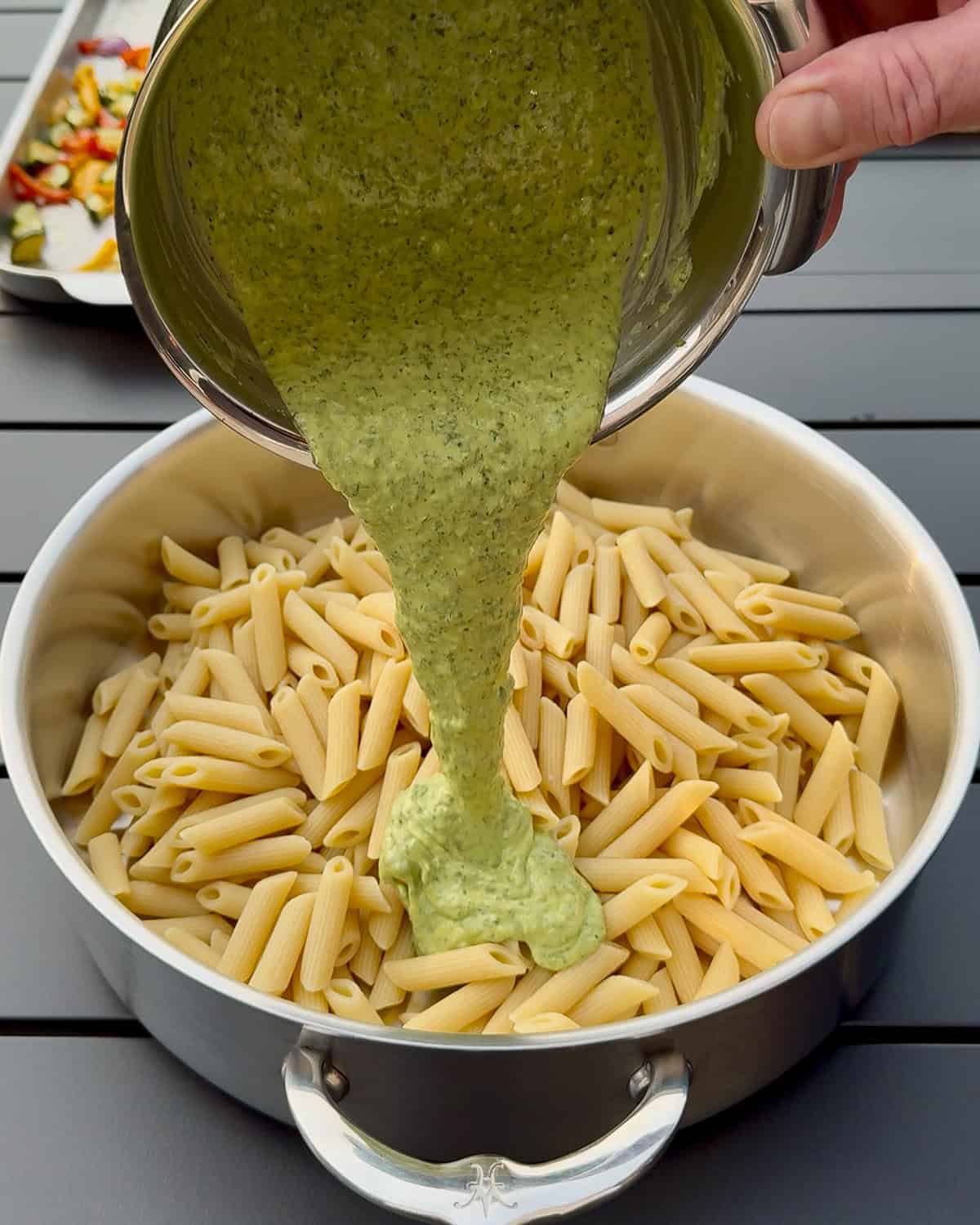 Add the zhoug-yogurt sauce to the pasta.