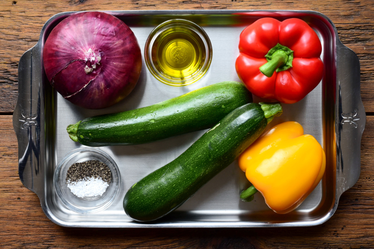 Roasted vegetable ingredients for a pasta salad.