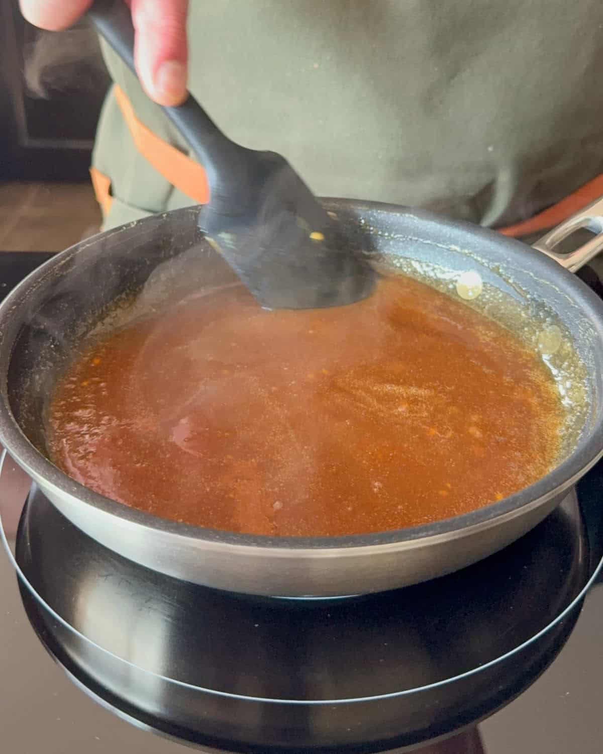 Heat and stir the glaze until the sugar has dissolved.