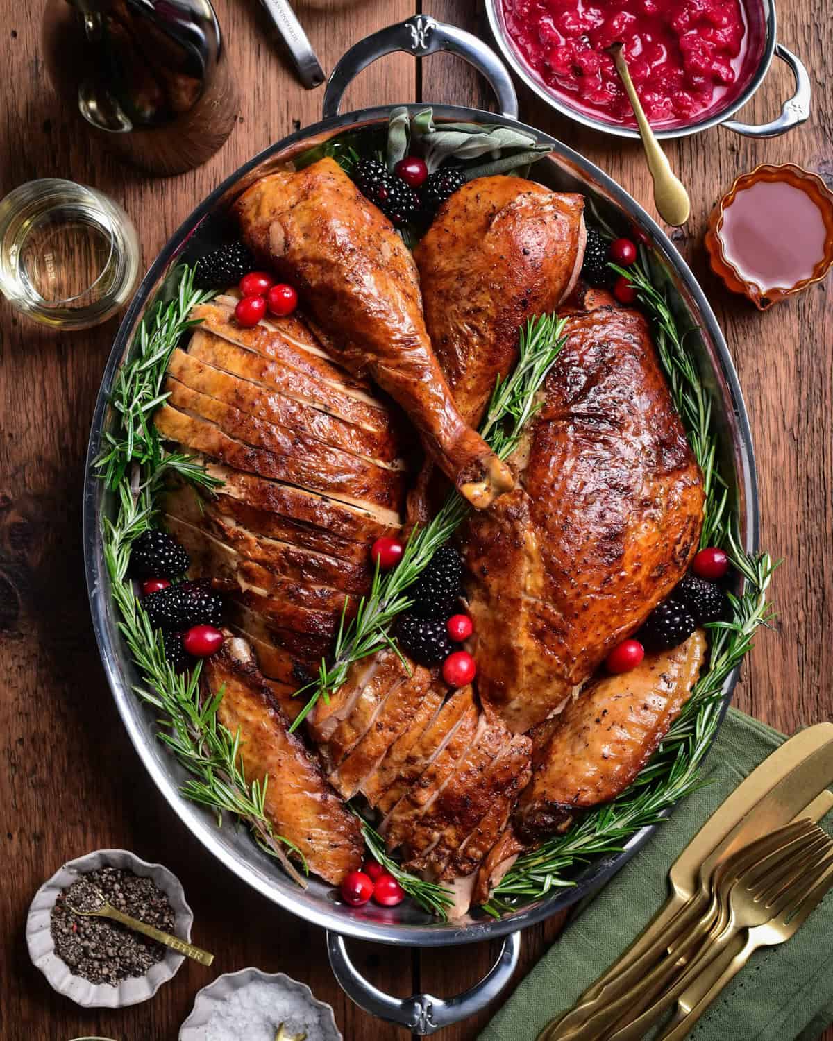 A festive sliced Tuscan turkey on a platter.