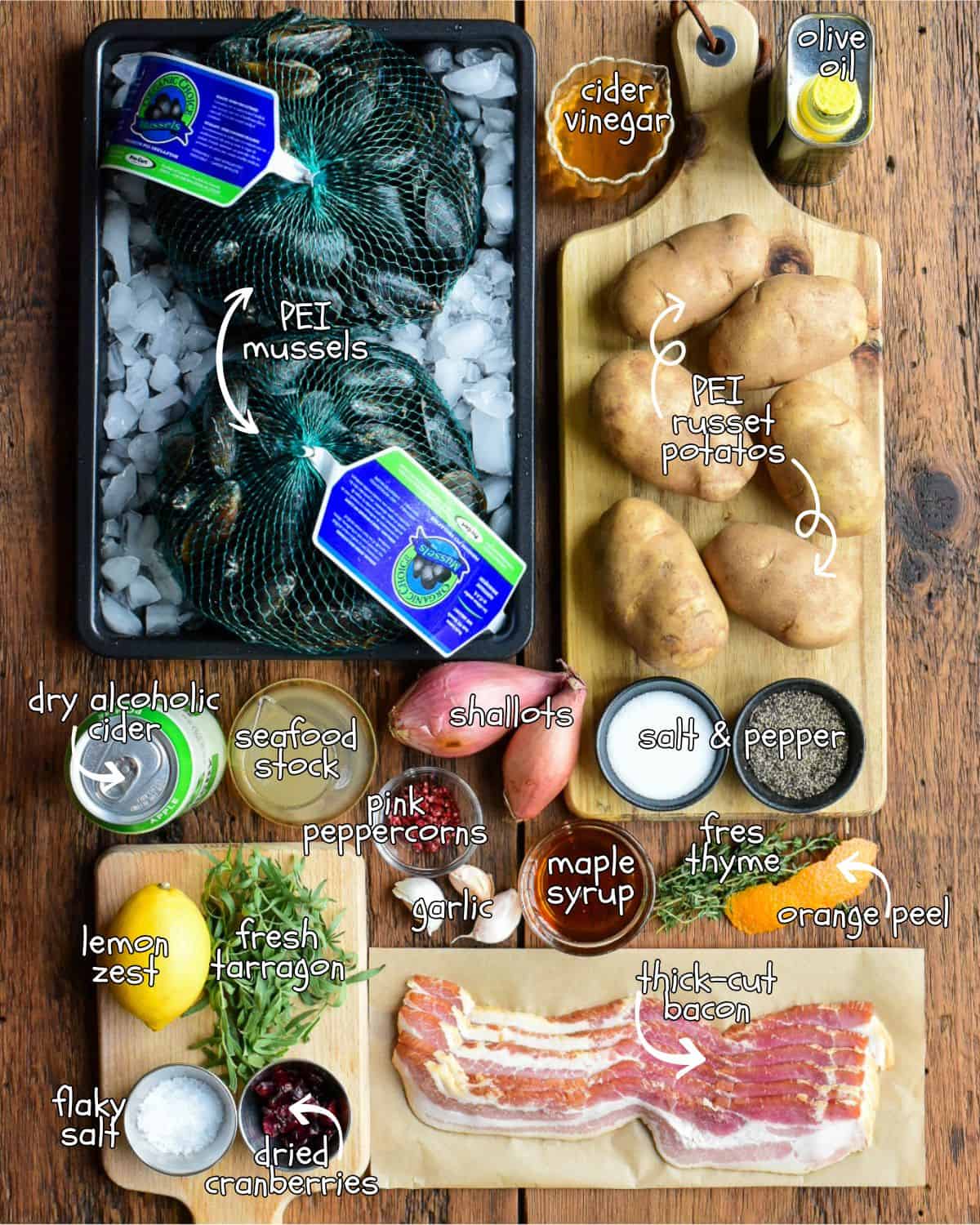 Ingredients laid out for a pei mussels recipe.