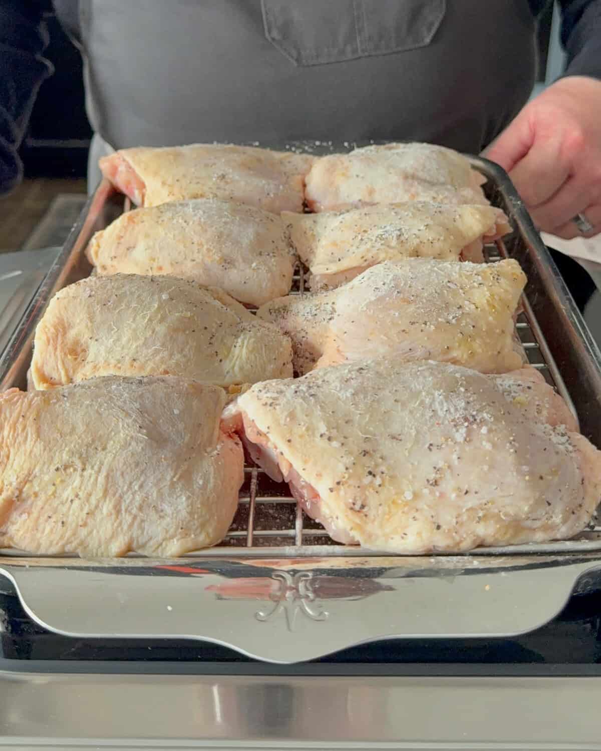 Prep the chicken skin with salt, pepper and baking powder.