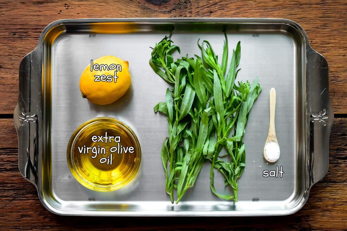 Ingredients for a lemon-tarragon oil recipe.