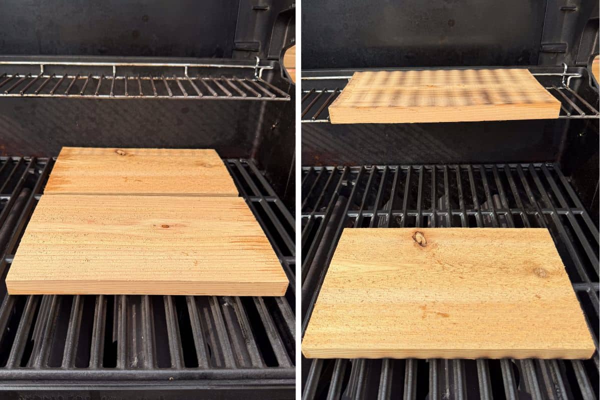 Two cedar planks on the grill are warming up before the salmon is added.