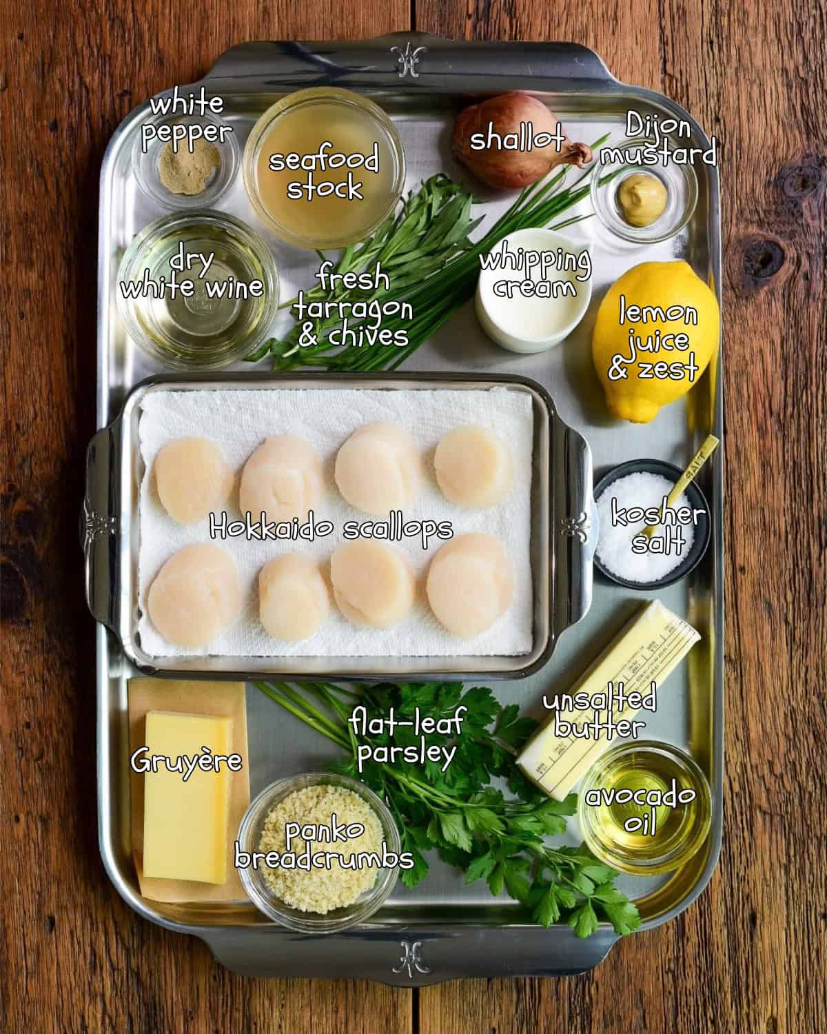 A tray with Hokkaido scallops and other ingredients for a French Scallops in White Wine Cream Sauce recipe.