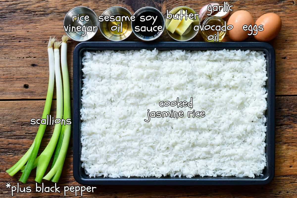 Ingredients laid out and labelled on a sheet pan for a crispy jasmine rice recipe.