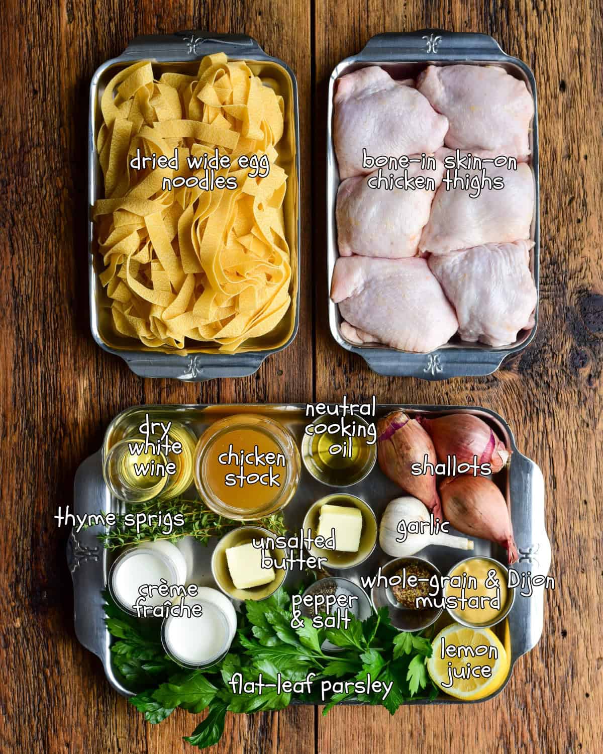 Ingredients for a Poulet à la Moutarde (French Mustard Chicken) in small sheet pans.