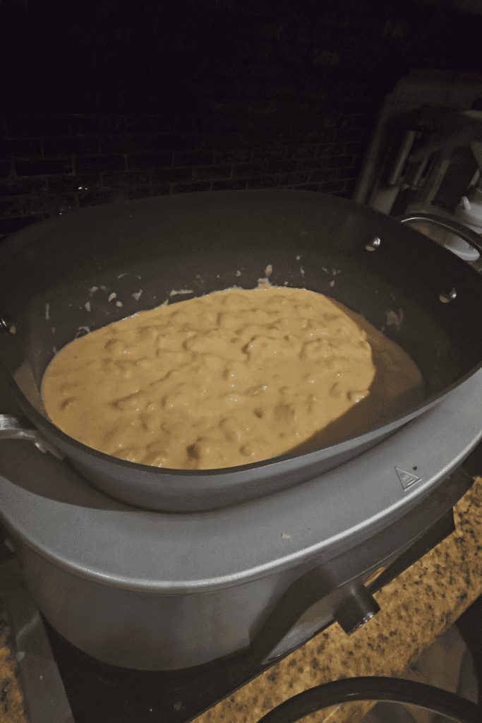 Creamy crockpot potato soup in a skillet.