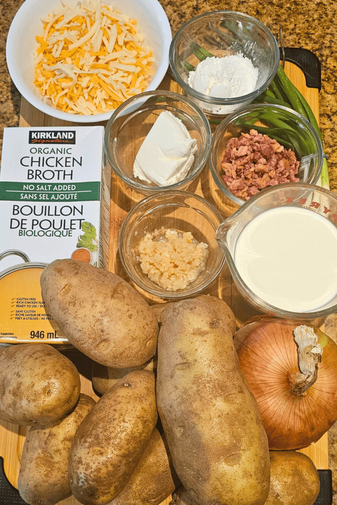 The ingredients to make Crockpot Potato Soup with cheese and bacon toppings.